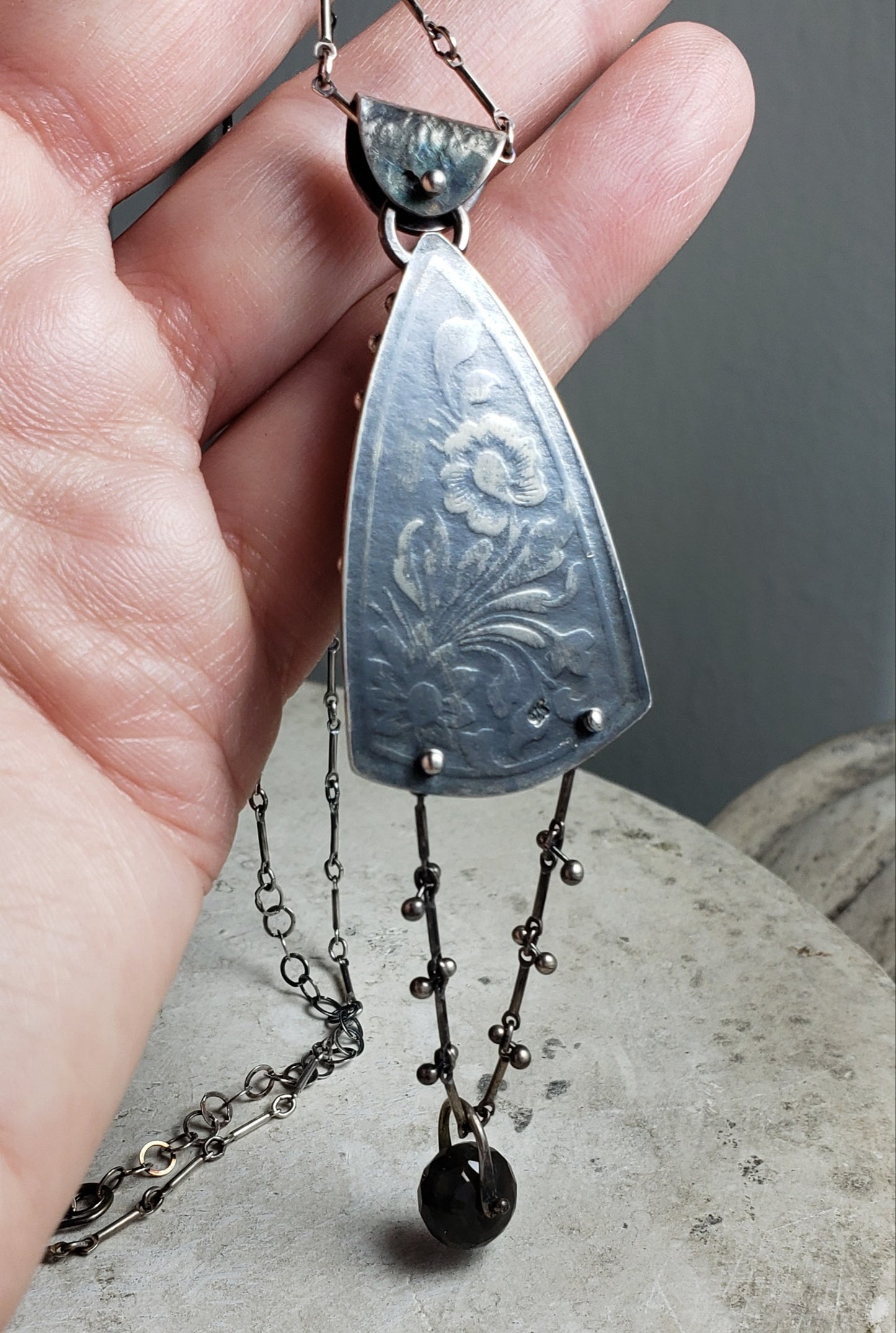 Amulet Necklace with Blue Labradorite and a Floral Embossed Backplate