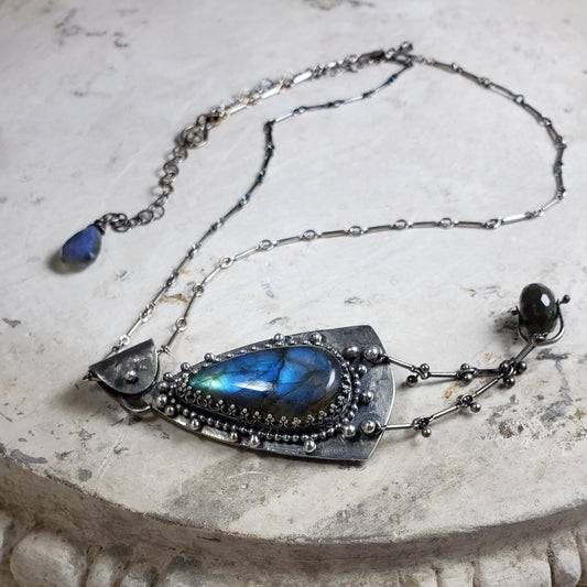 Amulet Necklace with Blue Labradorite and a Floral Embossed Backplate